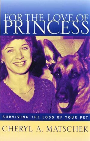 A woman and her dog are smiling for the camera.